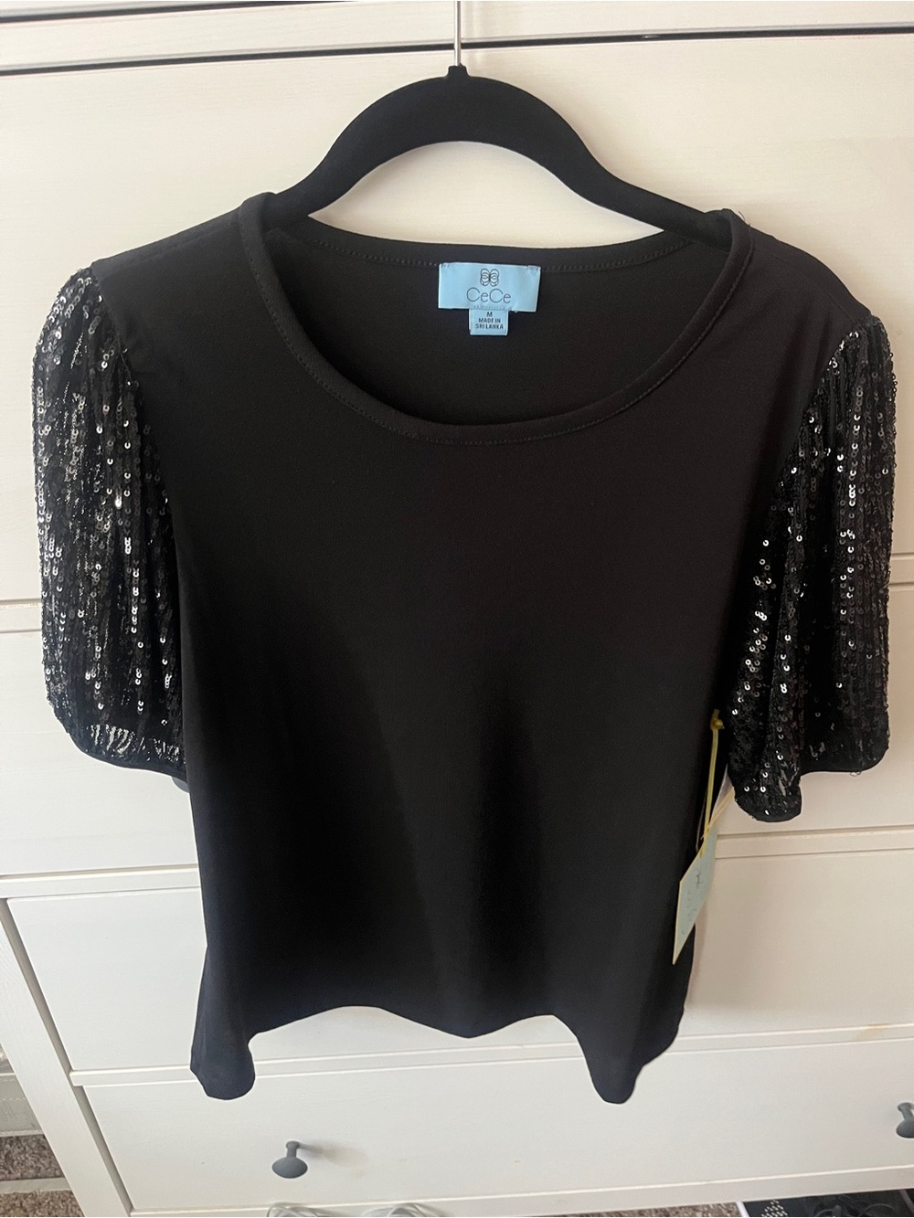 NWT CeCe Black Short Sleeve Top with Sequin Puff Sleeves Size medium
